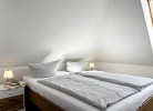 Schlafzimmer mit Doppelbett